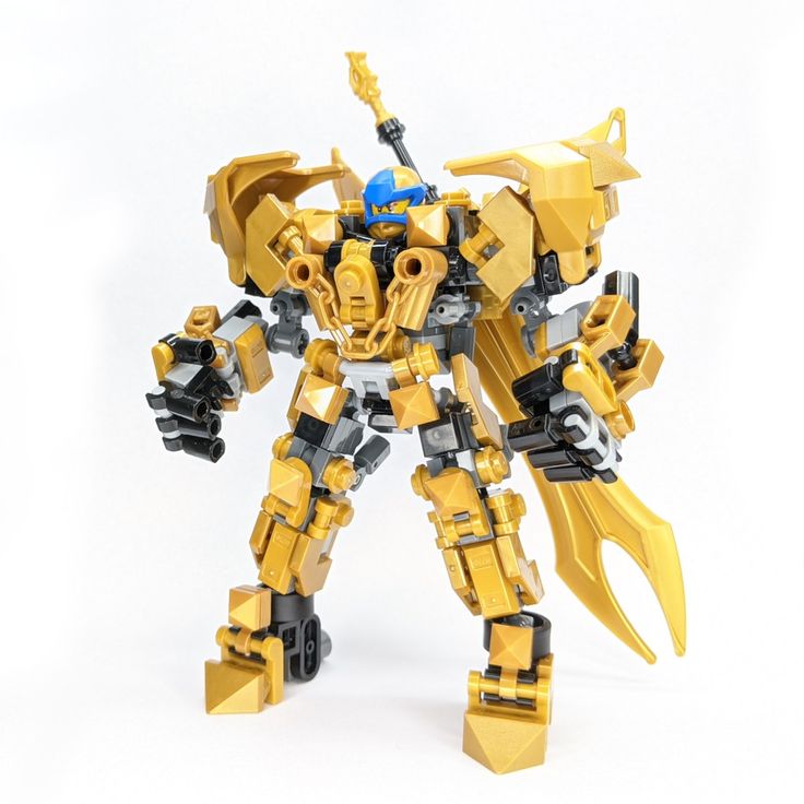 a yellow and black robot is on a white surface