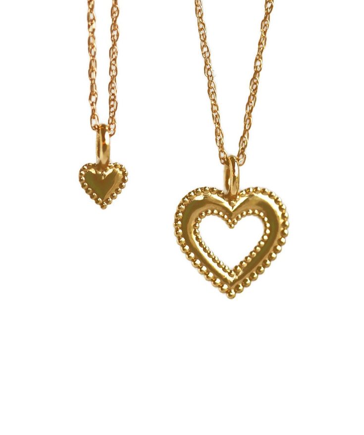 ~~ 14k Gold Hearts Mother Daughter Necklaces ~~ Fine jewelry created because every woman has a story. Each piece of the fine collection has been designed and created as an heirloom, with fine feminine details, to wear and cherish. Your necklace will be your favorite to wear everyday. An heirloom to treasure - elegant, eternal, and all around spectacular! Order your set with necklaces to share. Made entirely in the USA. Necklaces arrive in a gift box, with Mother Daughter card. Note any special c Heirloom Yellow Gold Heart Necklace, Heirloom 14k Gold Jewelry For Valentine's Day, Heirloom Yellow Gold Jewelry For Valentine's Day, Heirloom Yellow Gold Necklace With Heart Charm, Valentine's Day Heirloom 14k Gold Jewelry, Classic Double Heart Necklace For Mother's Day, Classic Necklace For Mother's Day Gift, Luxury 14k Gold Necklace For Valentine's Day, Yellow Gold Necklace With Heart Charm For Anniversary