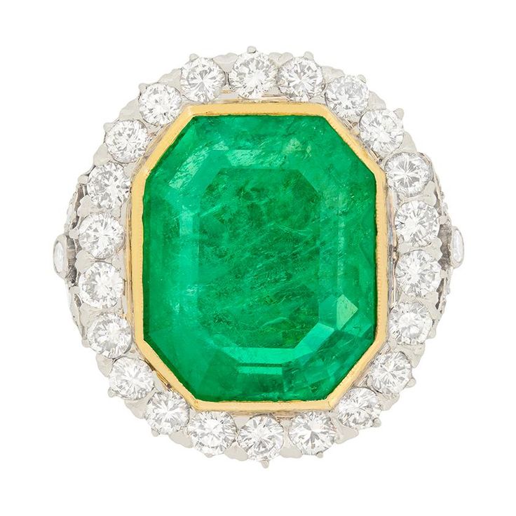 This absolutely breath-taking Art Deco Emerald ring is definitely one to be admired. With a simply stunning centre Emerald, origin Colombian and a lovely sea green colour to it, it has been certified by The Gem & Pearl Lab as moderately enhanced. It has a weight of 16.10 carat and is held in perfect position with an 18 carat yellow gold rub over setting. Working hand in hand with the Emerald to highlight it's beauty, it a beautiful halo of transitional cut diamonds. The diamonds have an estimate Trillion Diamonds, Art Deco Emerald Ring, Emerald Wedding Rings, Green Emerald Ring, Emerald Ring Gold, Platinum Diamond Rings, Emerald Diamond Ring, Diamond Halo Ring, Gold Cocktail Ring