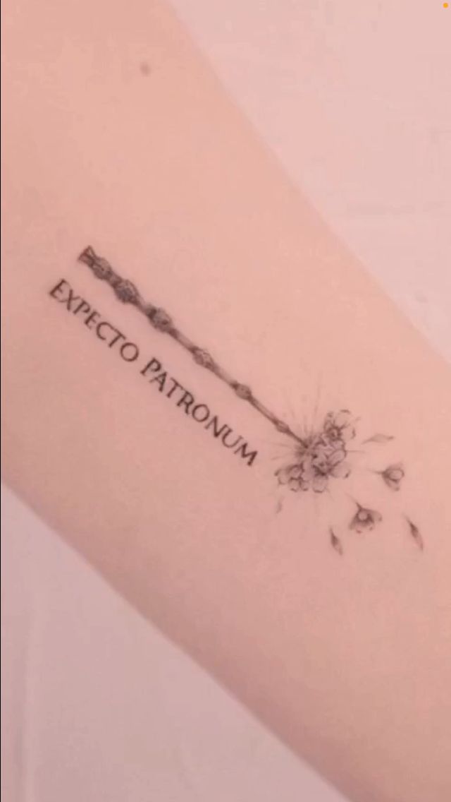 a tattoo that says expect patronum on the side of a woman's arm