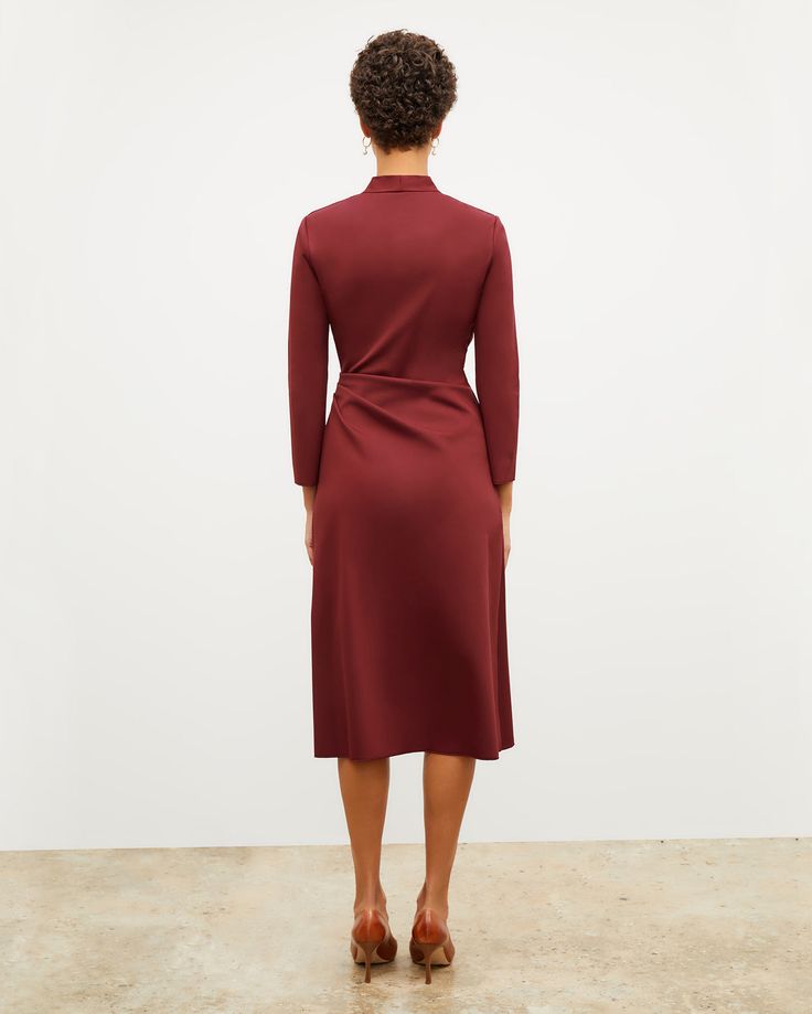 Carly Dress - Stretch Crepe :: Maroon – M.M.LaFleur Workwear Midi Dress With Pleated Back And Fitted Bodice, Fitted Draped Maxi Dress For Fall, Workwear Dress With Pleated Waist And Fitted Bodice, Elegant Draped Dress With Flattering Silhouette, Chic Draped Midi Dress For Fall, Elegant Fall Midi Dress With Ruching, Formal A-line Midi Dress With Ruched Detail, Elegant A-line Midi Dress With Ruched Detail, Elegant Midi Dress With Pleated And Fitted Waist