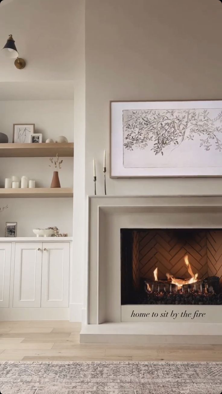 a living room with a fire place and shelves