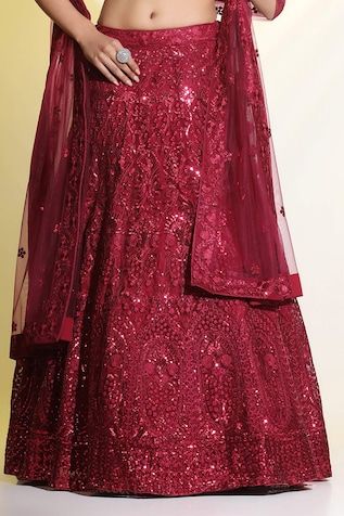 Maroon cancan attached lehenga featuring floral embroidery in matte and glossy sequined, cutdana, resham work all over. Paired with an embellished padded blouse and dupatta. - Aza Fashions Floor-length Sequin Fabric For Diwali, Red Sequined Dress For Navratri, Sequined Anarkali Set For Reception And Eid, Eid Reception Lehenga With Sequins, Sequin Lehenga For Eid Reception, Anarkali Sequin Gown For Diwali, Red Sequined Sets For Eid, Red Sequin Sets For Eid, Diwali Anarkali Gown With Sequins