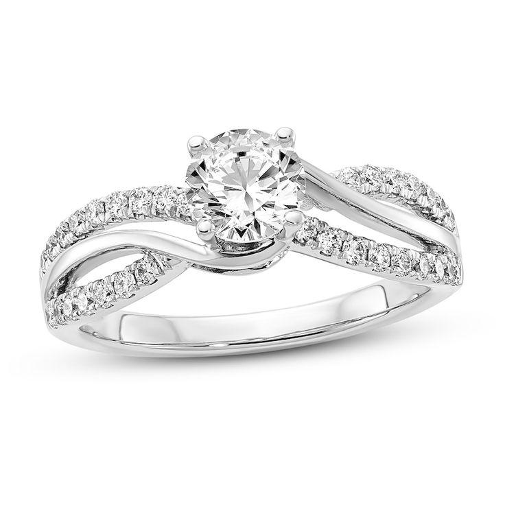 a white gold ring with diamonds on it