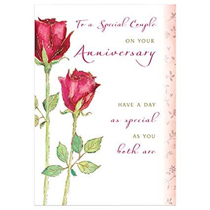 a card with two roses on it and the words, to a special couple on your anniversary