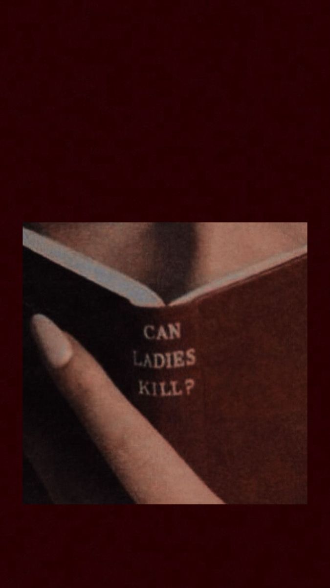 a hand holding an open book with the words can ladies kill? written on it