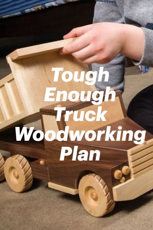 a young child playing with a wooden toy truck that says tough enough truck woodworking plan