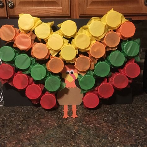 a turkey made out of cupcakes sitting on top of a counter