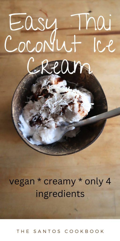 a bowl filled with ice cream on top of a wooden table