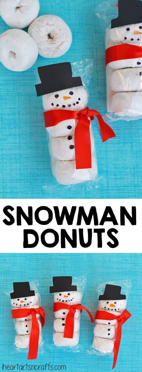 snowman donuts are wrapped in plastic and tied with red ribbon