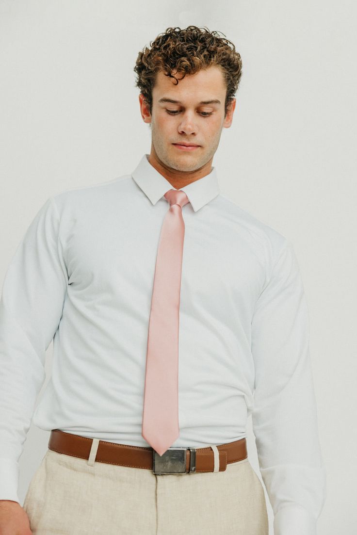 Indulge in luxury with our Solid Mauve Tie, perfect for weddings and special events. Made from high-quality polyester satin, its elegant sheen is sure to elevate your look. This popular tie is a must-have for any stylish and sophisticated wardrobe. Available in 2 Sizes: Skinny - 2.5" Width, 58" Length Wide - 3" Width, 60" Length Fabric: Handmade from 100% Polyester Satin Silk Fitted Suit And Tie Accessories For Wedding, Classic Fitted Satin Suit And Tie Accessories, Classic Satin Suit And Tie Accessories, Elegant Slim Fit Suit And Tie Accessories For Wedding, Wedding Suit And Tie Accessories With Satin Finish, Elegant Wedding Suit And Tie Accessories In Slim Fit, Wedding Satin Ties With Satin Finish, Classic Wedding Suit And Tie Accessories With Satin Finish, Elegant Satin Suit And Tie Accessories For Wedding