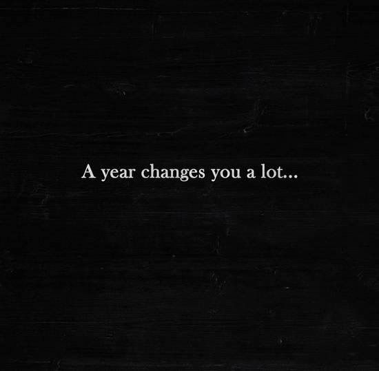 a black and white photo with the words a year changes you a lot on it