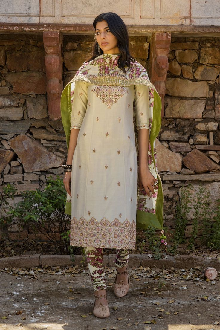 White straight long kurta with placement marodi-dabka hand embroidery. Comes with mint green-purple tone printed motif dupatta and churidar.
Components:3
 Embroidered, Printed
Neckline:Round
Sleeve Length:Three Quarter
Fabric:Silk Chanderi
Color:White
Side slits
Tassel dupatta
Back keyhole - Aza Fashions Yellow Sharara, Punit Balana, Long Kurta, Straight Kurta, Indian Fashion Designers, Churidar, Kurta Set, Designer Gowns, Silk Skirt