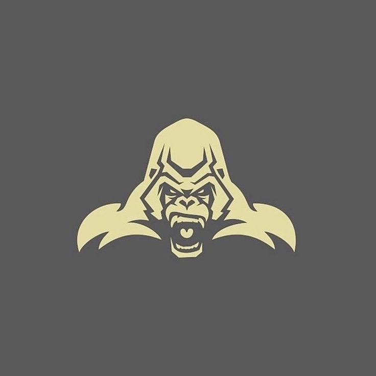 an angry gorilla face on a dark background