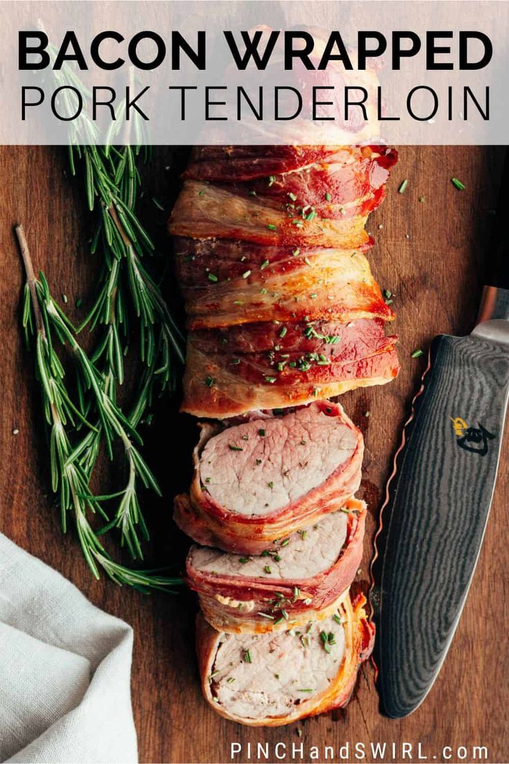 meatloaf wrapped in bacon and garnished with herbs on a cutting board