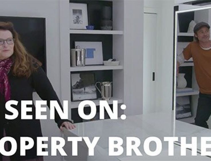 a man and woman standing in front of a mirror with the caption see on property brothers