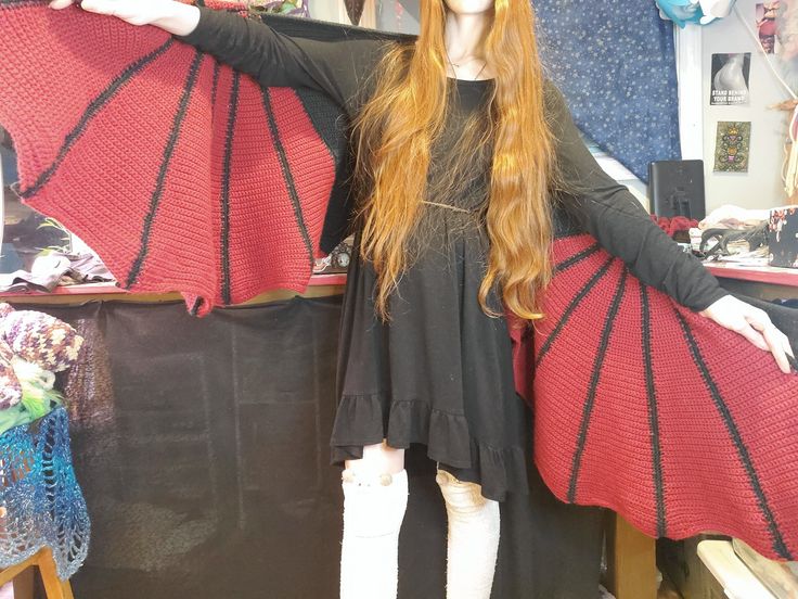 "*Ready to Ship* Vampire Bat Crochet Wing Shawl Made with Dragon Bat Wing Shawl Pattern by Crafty Intentions on Ravelry  * Measurements * Full Wingspan: 83\" Wing Panel Width: 23\" Wing Panel Height: 22\"  Back Panel Width: 37\" Back Panel Height: 14\" in middle, 21\" at sides Mannequin measurements Shoulder Width: 19\" Chest: 48\" Waist: 36\"  Hips: 46\" *Account for some give as materials stretch* *Materials* Acrylic yarn *Care* Hand wash, Air dry Velvet and fibrous yarns generate microplastics, and should only be washed when absolutely necessary." Bat Wing Shawl, Wing Shawl, Crafty Intentions, Bat Crochet, Vampire Bat, Bat Wing, Shawl Pattern, Bat Wings, Shawls And Wraps