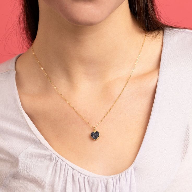 Black Druzy Mini Heart Pendant - Heart shape gemstone pendant with vermeil gold bezel - Jewelry gifts for her, mom, wife, daughter Stone: Black Druzy Heart Gemstone: 10mm x 10mm Gold chain: 14k gold filled Chain length: 16-18 inches adjustable Clasp: spring ring Bezel: Vermeil Gold About "Gold Filled Jewelry": Also called rolled-gold. These jewelry items are not actually filled with gold. They are made of a base metal covered by sheets of gold in a mechanical bonding process. Effectively a thick Black Jewelry For Mother's Day Gift, Black Heart Necklace For Mother's Day, Black Heart Charm Necklace For Mother's Day, Mother's Day Black Heart Pendant Jewelry, Mother's Day Black Heart Charm Necklace, Black Heart Pendant Jewelry For Everyday, Black Heart Pendant Necklace With Heart Charm, Black Heart Pendant Necklace For Valentine's Day, Black Heart Charm Pendant Jewelry