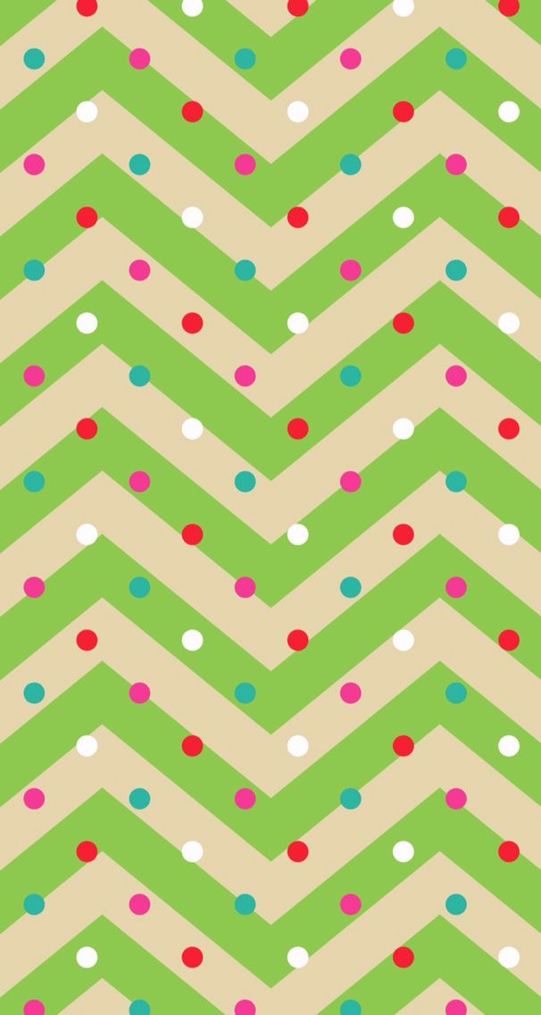 a green and white chevroned background with polka dots