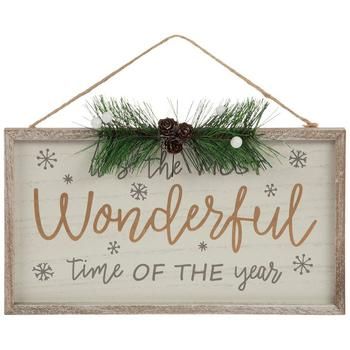 a wooden sign that says wonderful time of the year with pine cones and snowflakes