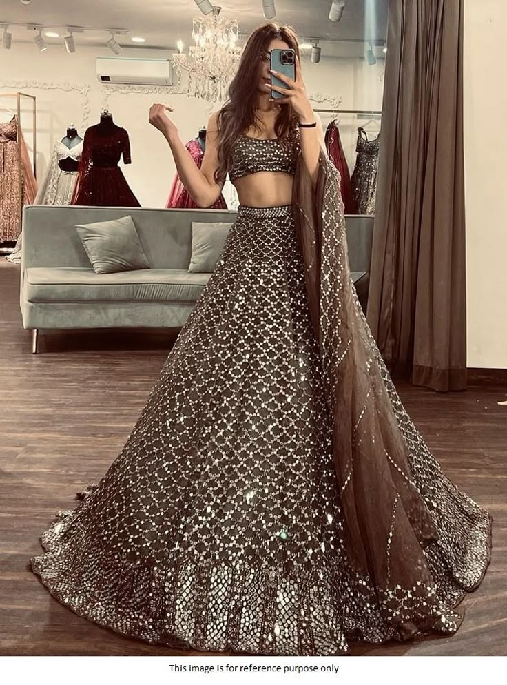 Bollywood Replica LehengaBollywood Model Brown Net sequins work lehengaLehenga in Premium Net Embellished With Beautiful Heavy 7MM Sequins Work With Both Heavy Cancan And Canvas With Inner Covering*( Semi Stitched Upto Xxl. )Flair :3 MtrBlouse in Premium Net Embellished With Beautiful 7MM Sequins Work With Silk Inner Given For Blouse( Unstiched )Dupatta in Premium Net Embellished With Beautiful 7MM Sequins WorkShipping time is 5-7 days.Buy this Lehenga at Kollybollyethnics and make your occasion Brown Lehenga, Choker Dupatta, Pakistani Lehenga, Dusty Brown, Indian Lehenga Choli, Party Wear Lehenga Choli, Bridesmaid Attire, Indian Wedding Wear, Indian Lehenga