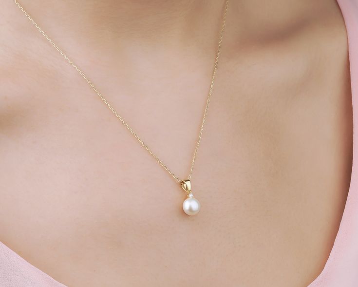 * Stunning handmade solid gold pearl necklace . 14K and 18K options are avaliable. Adorned with tiny beads of white zircon gemstone, used to emphasize the unique design. The necklace has an elegant design in every aspect. It is very stylish and convenient for daily use. You will not be able to take your eyes off the fascinating color of opal stone and the magnificent glitter of solid gold * ★Item Details ♥Made to Order ♥Gold Kt: 14K & 18K ♥Available Gold Color: Gold, Rose Gold, White Gold ♥P 14k Gold Necklace With Pearl Pendant For Wedding, White Pearl Necklace In 14k Gold For Wedding, White 14k Gold Pearl Necklace For Wedding, Gold Plated Pearl Pendant Necklace For Wedding, 14k Gold Pearl Necklace With Pearl Charm For Wedding, Gold Bridal Necklace With Akoya Pearl Pendant, 14k Gold Necklace With Pearl Charm For Wedding, Wedding Necklace With Pearl Charm In 14k Gold, Wedding Pearl Necklace With 14k Gold Pendant