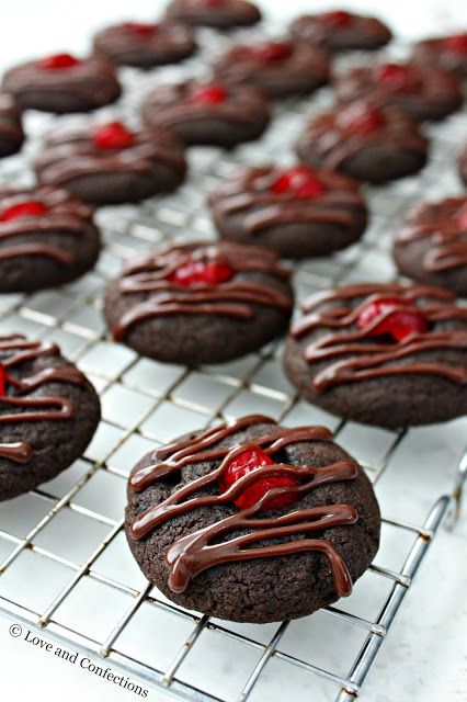 cookies with chocolate frosting and drizzles on a cooling rack, ready to be eaten