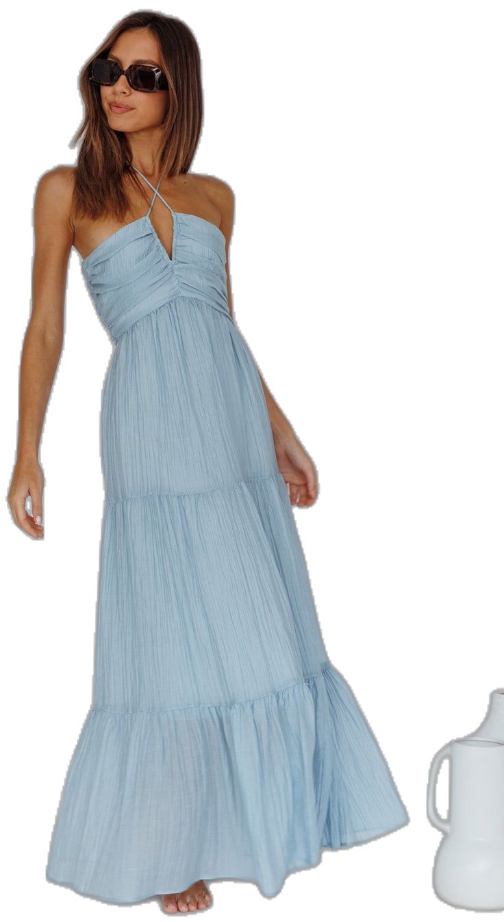 Chic Ruched Halter Maxi Dress, Solid Summer Maxi Dress With Ruched Bodice, Halter Neck Maxi Dress With Ruched Bodice, Ruched Halter Neck Maxi Dress For Spring, Spring Blue Maxi Dress With Ruched Bodice, Ruched Halter Neck Maxi Dress For Vacation, Spring Solid Maxi Dress With Ruched Bodice, Beach Maxi Dress With Ruched Bodice, Blue Flowy Maxi Dress With Ruched Bodice