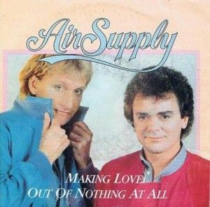 an advertisement for the album making love out of nothing at all, featuring two men