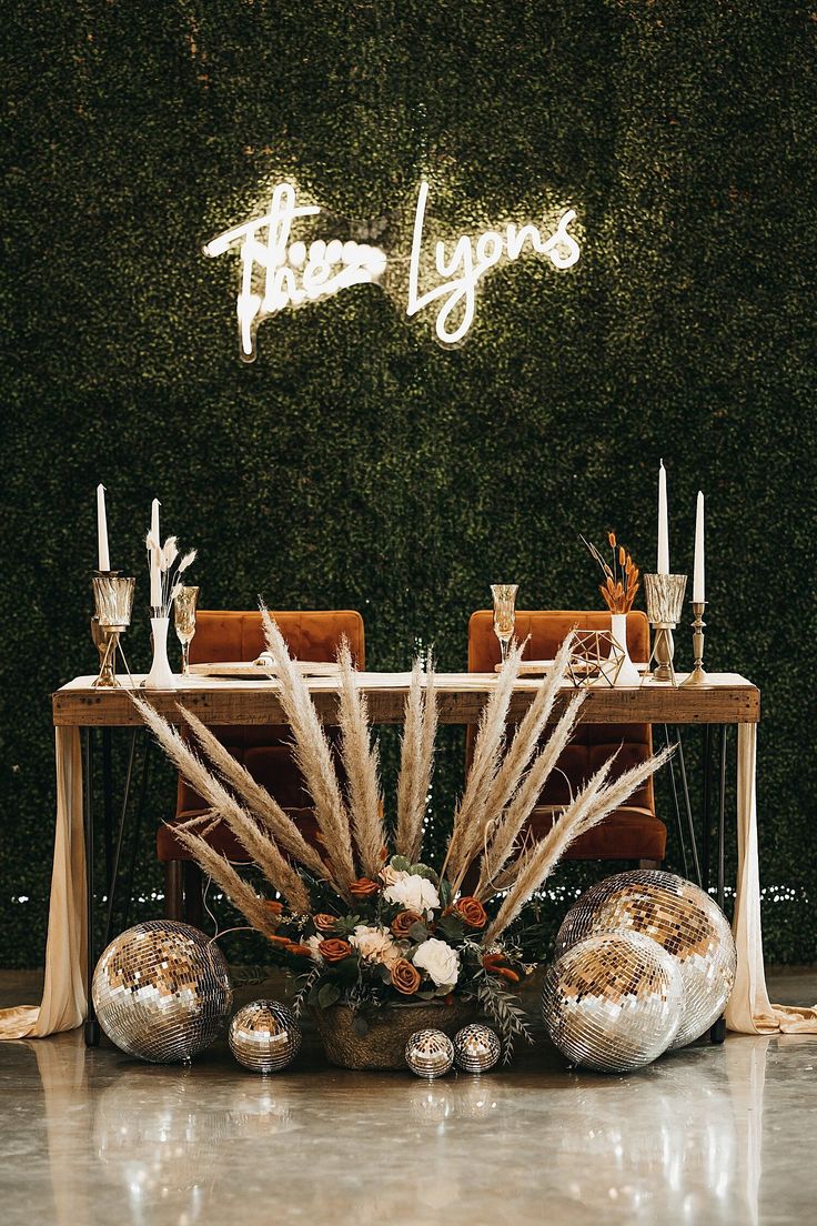 the table is set with candles and decorations