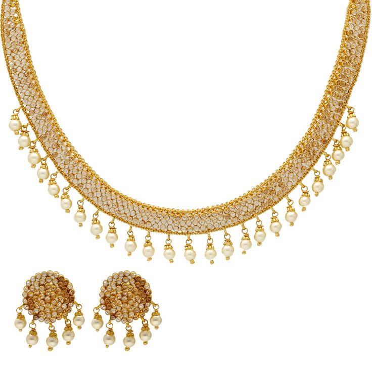 This radiant 22k yellow gold and polki jewelry set has an elegant and sophisticated design any women would love. The traditional polki stones used in this magnificent Indian jewelry set for women is enhanced by a dazzling assortment of white pearls to complete the look. Features • 22k yellow gold • CZ stones • Pearls • Filigree Virani Jewelers bridal jewelry made from 22k gold and precious gemstones brings together the beauty and significance of Indian culture and traditions. Find more beautiful 22k Gold Pearl Necklace For Celebrations And Festivals, 22k Gold Pearl Necklace For Diwali, Elegant Round Kundan Necklace For Eid, Festive Gold Diamond Temple Necklace, Elegant Kundan Necklace For Eid, White Cubic Zirconia Bollywood Jewelry, Dazzling Gold Jewelry Sets For Festive Season, Dazzling Gold Jewelry Sets For Festive Occasions, Bollywood Style White American Diamond Jewelry