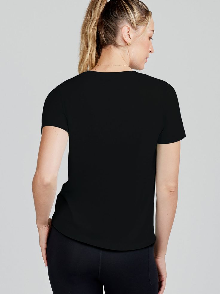 This wear-anywhere, do-everything All Day T-Shirt is made for those on the move. It's perfect for high-intensity workouts or paired with leggings for a casual look. Durable, insanely soft tees that you can rely on day in and day out. Made with lightweight, breathable, moisture-wicking bamboo fabrication, this is your favorite go-to tee, but better. They have the same qualities and function as your favorite workout tees, yet made for everyday wear. Style #TW905 Black Go-dry Tops For Yoga, Black Go-dry Top For Yoga, Black Athletic Fit T-shirt For Athleisure, Basic Go-dry T-shirt For Workout, Versatile Black Tops For Gym, Black Relaxed Fit Top For Yoga, Black 4-way Stretch Tops For Gym, Black 4-way Stretch Gym Tops, Black Athleisure T-shirt For Yoga