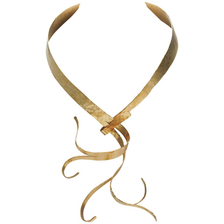 Gold-plated and hand-hammered necklace/sculpture "FLORA" by Jacques Jarrige. Jacques Jarrige's jewelry is more companion than ornament, heightening one's physical awareness and bestowing the pleasure of inhabiting a well-built structure, a structure so light that it doesn't weigh on the body while delivering the theatricality of Jarrige's fluid gestures, translated into common yet gorgeously crafted metals. Their intentional lack of preciousness allows for a sense of spontaneous playfulness. Elegant Adjustable Bronze Necklace, Sculptural Jewelry With Polished Finish For Formal Occasions, Modern Gold Sculptural Jewelry, Modern Sculptural Gold Jewelry, Contemporary Sculptural Gold Jewelry, Elegant Hammered Choker Necklace, Elegant Hand Forged Choker Necklaces, Elegant Brass Necklaces With Unique Variations, Elegant Brass Necklace With Unique Variations