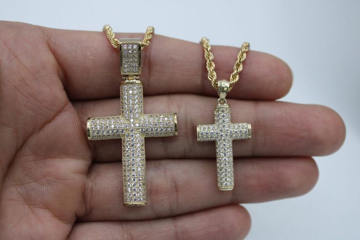 10k Gold Round cut shape Cross Jesus Pendant for Necklace Chain Religious Christian (Pendant Only) 10k Yellow Gold Small Charm Length : 32mm( Including Bail ) 25mm (without the Bail) Pendant Weight : 2.6g Charm Width : 16mm Large Charm Length : 47mm( Including Bail ) 35mm (without the Bail) Pendant Weight : 5.2g Charm Width : 25mm Main Stone : Cubic Zirconia Stone Shape : Round Cut Stone Color : White/Clear Gender : Mens/Women ( Unisex ) Iced Gold Cuban Link Jewelry, Iced Diamond Gold Jewelry, Gold Iced Cuban Link Jewelry, Gold Iced Jewelry Gift, White Bling Jewelry For Streetwear, Gold Iced Out Jewelry For Gift, White Iced Out Cross Jewelry, Gold Diamond Cut Cross Pendant Jewelry, White Gold Cross Pendant With Vvs Clarity