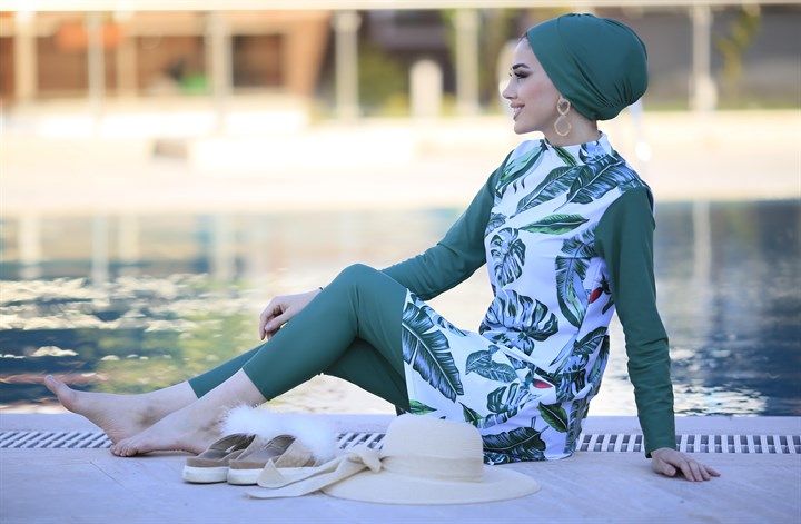 Green Leaves Burkini, inspired by nature, will make you look both trendy, cool, and modern. Are you ready to meet this year's trendiest burkini modest swimwear with fabric that does not absorb water at all? A great alternative while swimming or having a pleasant time by the pool! Continue to wear your elegance every day of the year, buy your Islamic swimwear now. Green Swimwear With Uv Protection For Outdoor, Green Uv Protection Swimwear For Outdoor, Green Stretch Swimwear For Outdoor, Spring Green Swimwear, Green Spring Swimwear, Spring Outdoor Swimwear With Uv Protection, Green Spring Outdoor Swimwear, Uv Protection Swimwear For Spring Outdoor Activities, Uv Protection Swimwear For Outdoor Spring Use