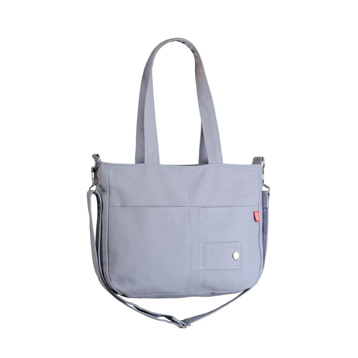 Gray Canvas Shoulder Purse Bag, Outer Pocket, Long Removable Adjustable Strap, Gift For Her, Vegan Purse, Vibrant Color Purse, Modern Bag, Simple Minimal Handbags, Gifts For Her Don't hesitate to contact us for customization and embroidery options. HOW TO ORDER DIFFERENT COLORS: -Visit my current fabrics color list web page. Exterior and interior fabrics are listed separately  https://hippirhino.com/colors/ -Write your selected exterior and interior colors on the order note. That's all. FABRIC: High-quality cotton canvas. Eco-friendly. Washable & Durable Color: Light Gray zipper closure LINING :  %100 Cotton. Organic Fabric, Separated pocket, Zipper  pocket, Key hook MEASUREMENTS : Width: 13,78 inches (35 cm) Height: 10,63 inches (27 cm) Deep: 2,95 inches (7,5 cm) Opening: 14,96 inches (38 Vegan Purse, Interior Colors, Vegan Purses, Simple Tote, Modern Bag, Canvas Purse, Grey Bag, Crossbody Tote Bag, Crossbody Tote