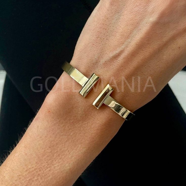 All Our Bracelets Are Made Of REAL 14K GOLD 14K Yellow Gold Bar Cuff Bangle Bracelet, 6mm Thick, Real Gold Bracelet, Polished Gold, Women Shop our 14K Bracelets https://www.etsy.com/shop/GOLDMANIA?ref=seller-platform-mcnav§ion_id=26925987 Shop On Sale items https://www.etsy.com/shop/GOLDMANIA?ref=seller-platform-mcnav§ion_id=1 Metal: 14K Yellow Gold    Width: 6 MM  Length: 7 IN  Closure: Cuff Weight: 10.00 Gram Hollow gold bracelet SHIPPED FROM NEW YORK CITY FREE SHIPPING on all orders IN THE US Gold Cuff Bracelet With Polished Finish, Gold Cuff Bracelet With Bracelet Strap For Anniversary, Formal Stackable Cuff Bangle Bracelet, Formal Stackable Bangle Cuff Bracelet, Yellow Gold Cuff Bracelet With Shiny Finish As Gift, Yellow Gold Cuff Bracelet With Shiny Finish, Real Gold Bracelet, Womens Bangles, Free Weight