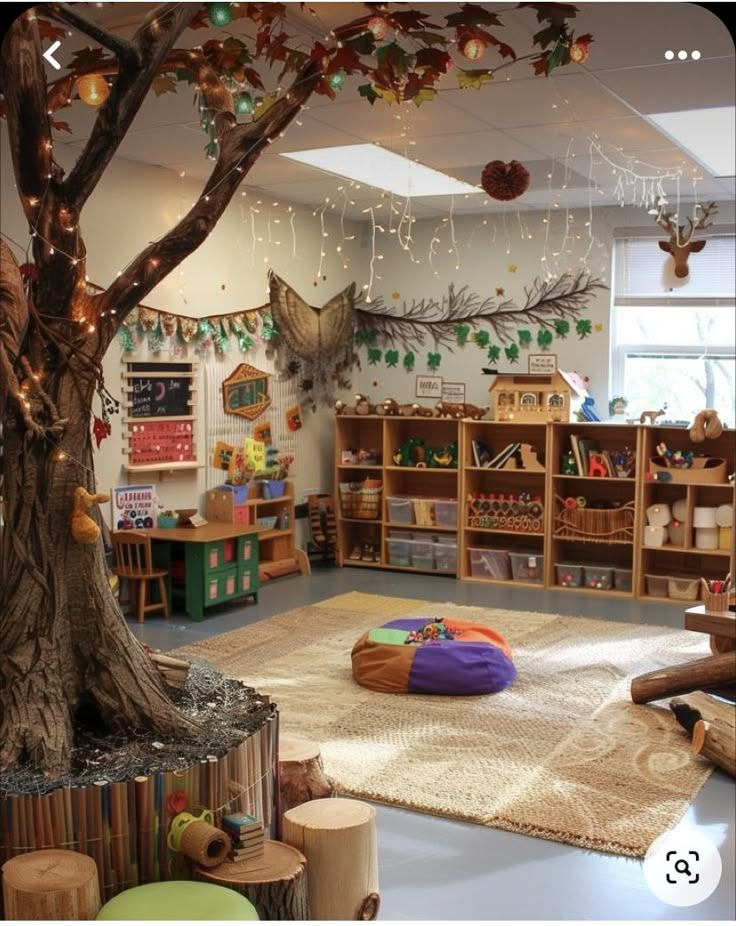 a child's playroom with lots of books and toys on the floor, including a tree