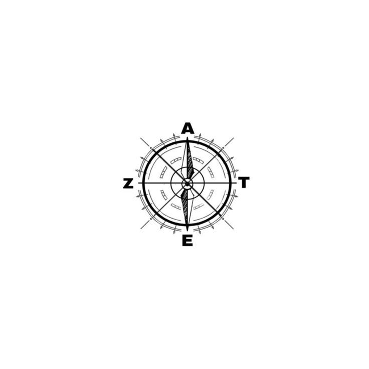 a black and white photo of a compass with the letter e in it's center