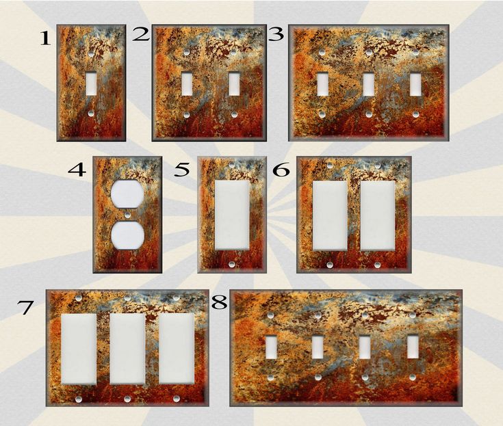 the four switch plates have rusted metal designs on them