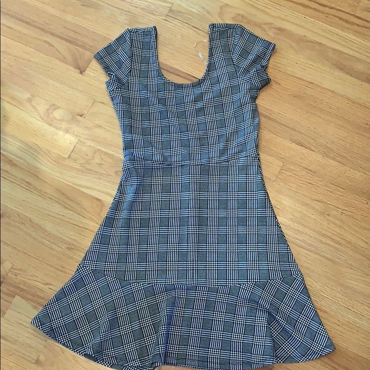 Casual And Comfortable Black Plaid Dress Lined Stretch Casual Dress, Casual Stretch Mini Dress With Lining, Casual Fit And Flare Mini Dress With Lining, Casual Lined Fit And Flare Mini Dress, Casual Fit And Flare Mini Dress Lined, Black Lined Fit And Flare Mini Dress, Black Fit And Flare Lined Mini Dress, Black Plaid Dress, Pull Over Dress