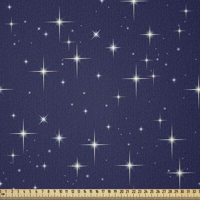 a ruler is next to a blue background with white stars and small, light - colored stars