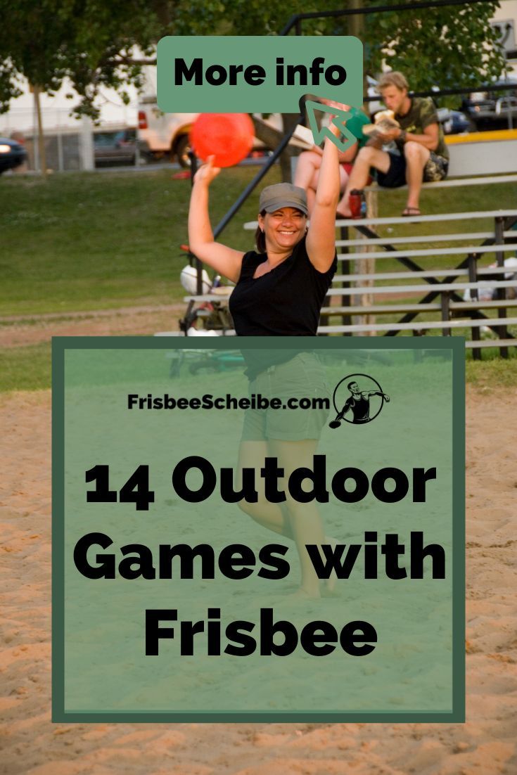 a woman is playing frisbee on the beach with her arms in the air