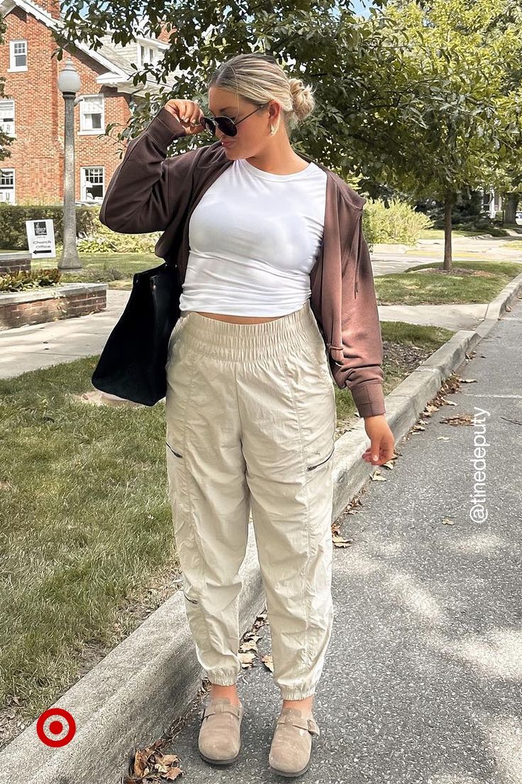 Slip into cute fall looks with comfy cargo joggers. Pair it with a cozy hoody for an outfit you’ll love wearing on repeat. Put That S On Outfits, Fall Relaxed Fit Full Length Cargo Jeans, Fall Relaxed Fit Washed Cargo Pants, Trendy Fall Cargo Parachute Pants, Fall Relaxed Fit Parachute Pants With Cargo Pockets, Trendy Brown Cargo Pants With Cargo Pockets, Midsize Influencers, Cute But Comfy Outfits, Perfect Fall Outfit