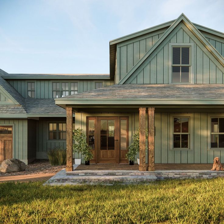 a large green house sitting on top of a lush green field