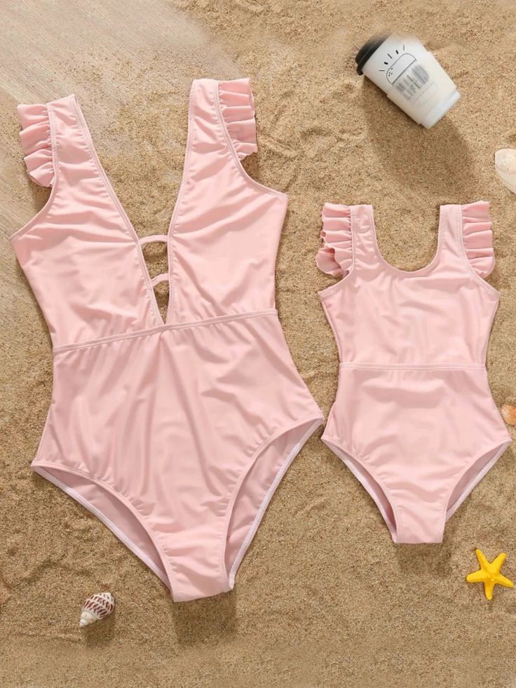 Dive into summer in style in our Mommy and Me flutter sleeve swimsuit and make your bond even stronger. Serving cute style with its baby pink colorway, flutter sleeves and flattering fit. The perfect summer essential for you and your little one. Available in sizes 9MON-24MON for babies; 2T-9Y for girls; S-XL for women. Solid Color Swimsuit, Playful Palette, Chic Swimsuit, Sleeve Swimsuit, Poolside Fashion, Girl Sleeves, Matching Mom, Swimsuit Design, Matching Swimwear