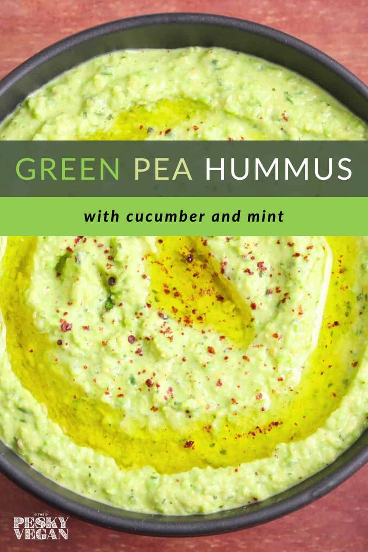 green pea hummus with cucumber and mint in a bowl on a table