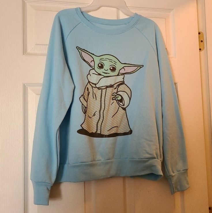 Nwt Blue Star Wars Sweatshirt With Baby Yoda. New, Never Worn. Blue Casual Sweatshirt With Cartoon Print, Blue Cartoon Print Sweatshirt For Streetwear, Cotton Sweatshirt With Character Print For Loungewear, Character Print Cotton Sweatshirt For Loungewear, Cotton Character Print Sweatshirt For Loungewear, Blue Character Print Sweatshirt, Blue Cotton Sweatshirt With Character Print, Blue Casual Sweatshirt With Character Print, Casual Blue Sweatshirt With Character Print