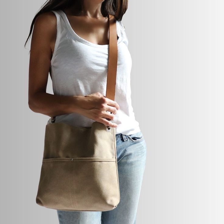 Urban-chic style crossbody bags that are neutral in color and effortlessly casual. When you need a mid-sized bag with easy access front pockets, just the right amount of not-too-slouchy shape and the perfect neutral shade, our updated take on the modern hobo bag is sized just right for everyday, on-the-go use. This listing is for the MEDIUM size bag in Khaki canvas. Hobo Bags For Women, Canvas Hobo Bag, Urban Chic Fashion, Hobo Bags, Waxed Canvas, Urban Chic, Crossbody Strap, Hobo Bag, Have A Great Day