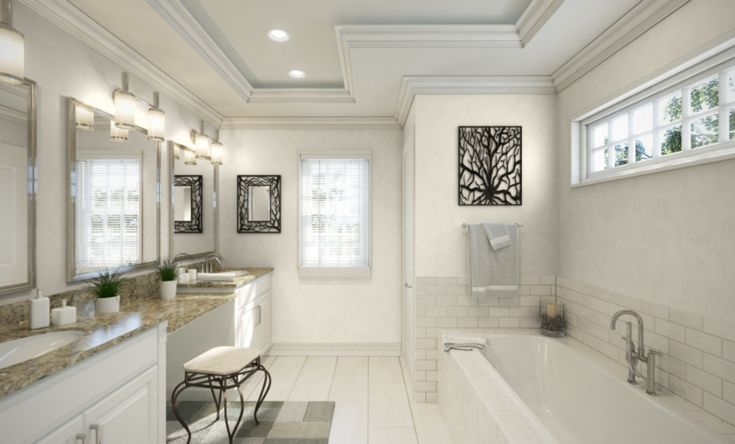 a large bathroom with two sinks and a bathtub